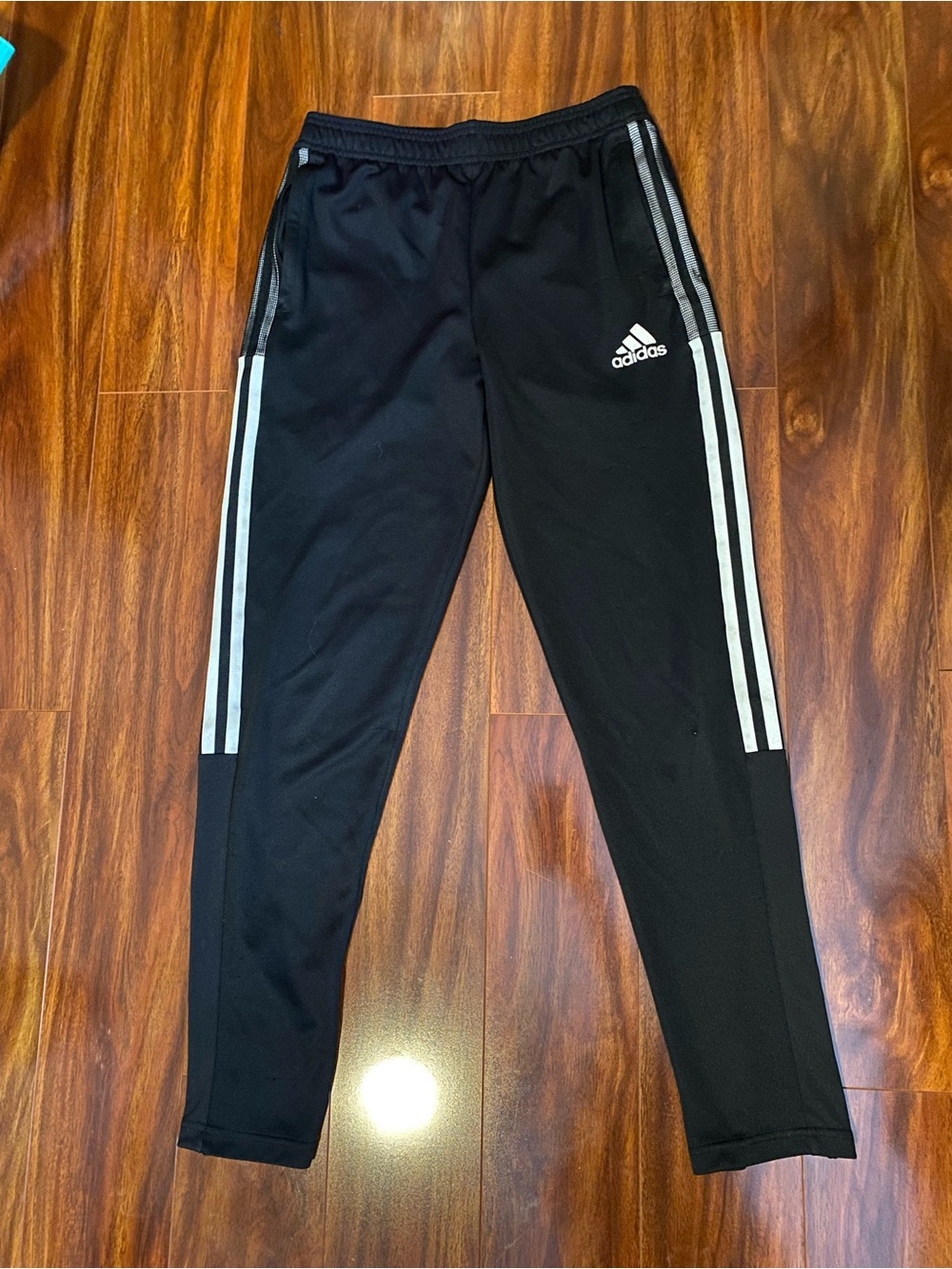 Adidas Black Three-Stripe Track Pants with zipper pockets